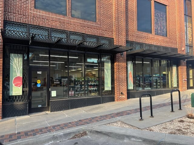 TakeRoot Farm Stop outside of building